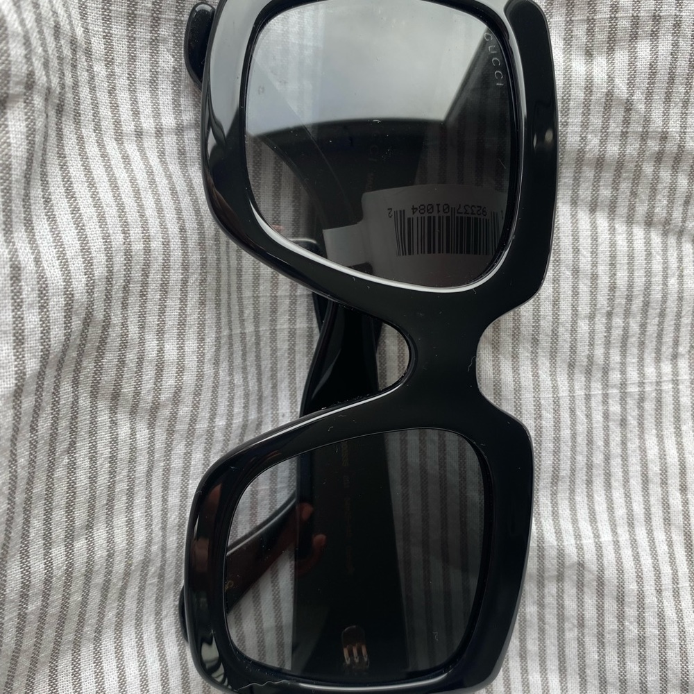 Black over sized Gucci sunglasses